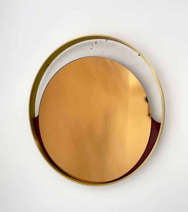 Round mirror, 1970s – ottone, legno, vetro specchiato ambra. Ø 80 cm Profondita 5 cm                                                              