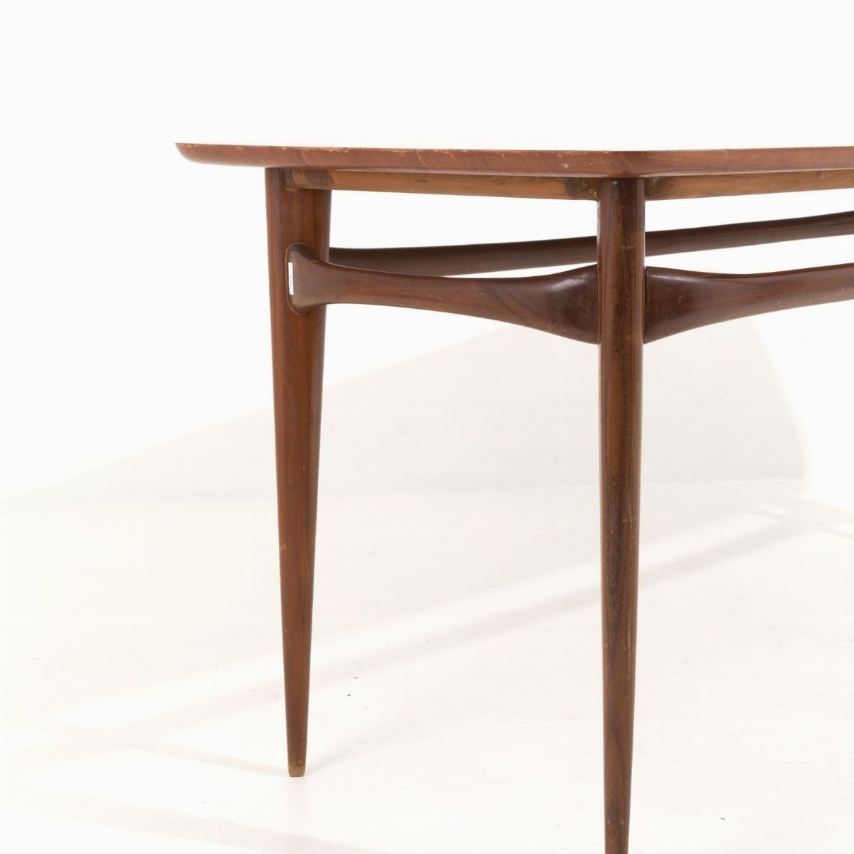 SILVIO CAVATORTA. Walnut table with veneered top, 60s