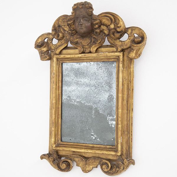 Specchio italiano antico in legno dorato dipinto