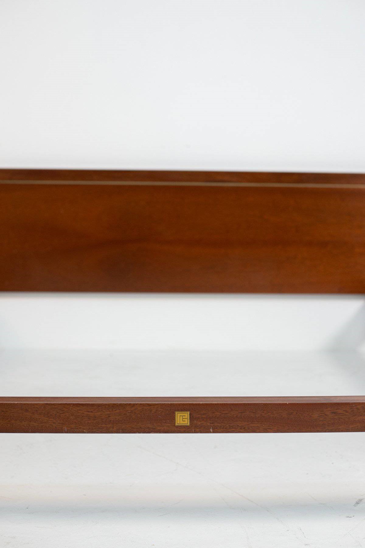 Testiera letto, firmata