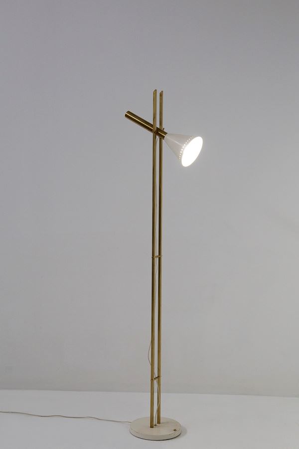 Brass and aluminum floor lamp, directional. 