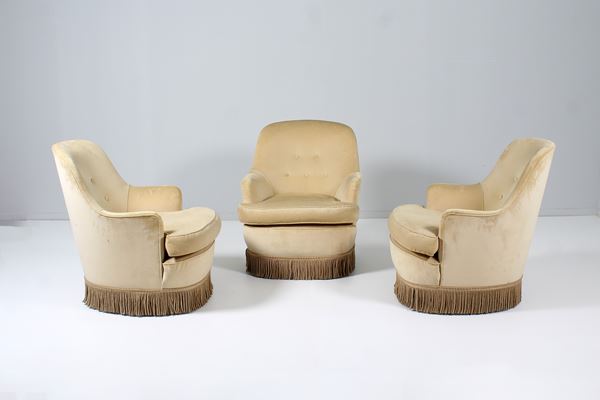 Three cream velvet armchairs in the style of Veronesi