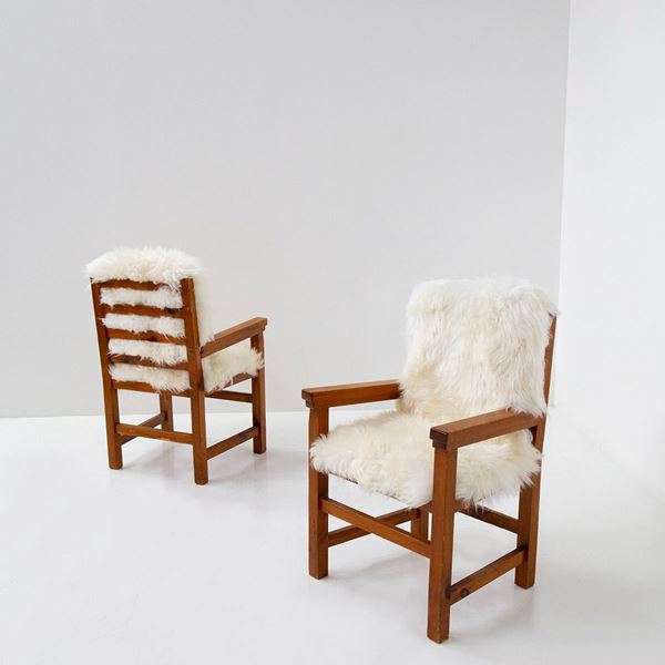 Pair of italian armchairs in white fur and walnut wood