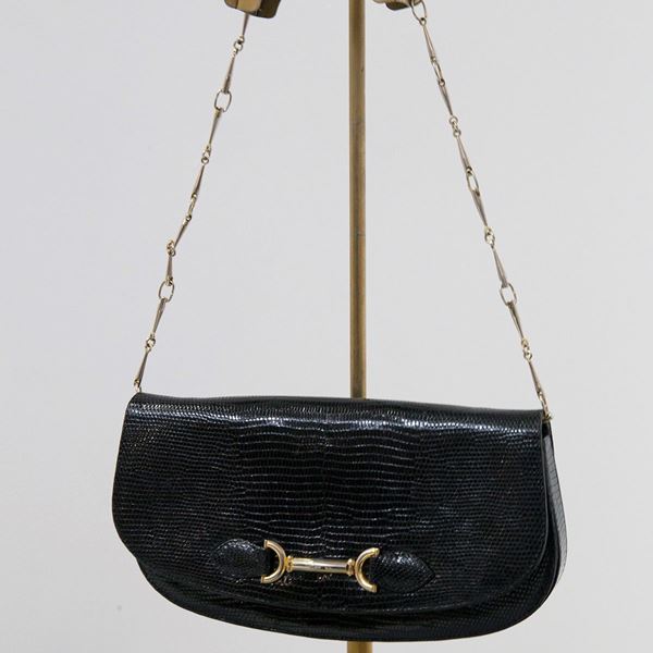Borsa vintage in pelle nera e metallo dorato