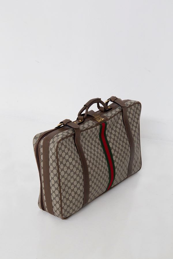 Guccio Gucci - Gucci suitcase in GG fabric and leather 