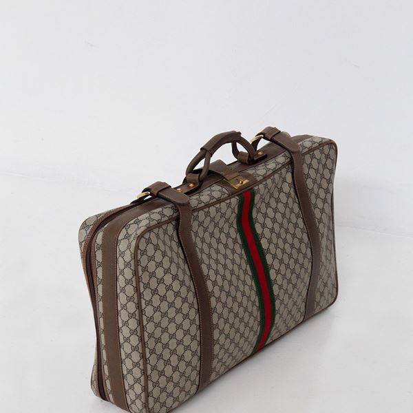 Guccio Gucci - Gucci suitcase in GG fabric and leather 