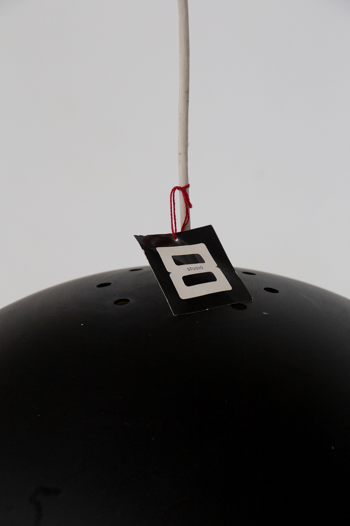 Lampadario per Esperia, Etichetta