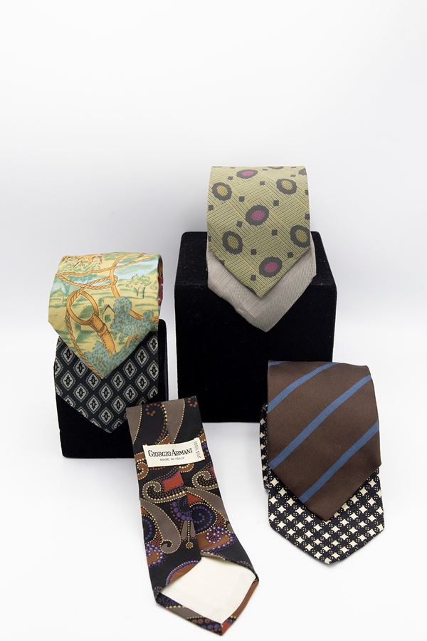 Giorgio Armani - Set of 7 Giorgio Armani ties in various colors and textures.