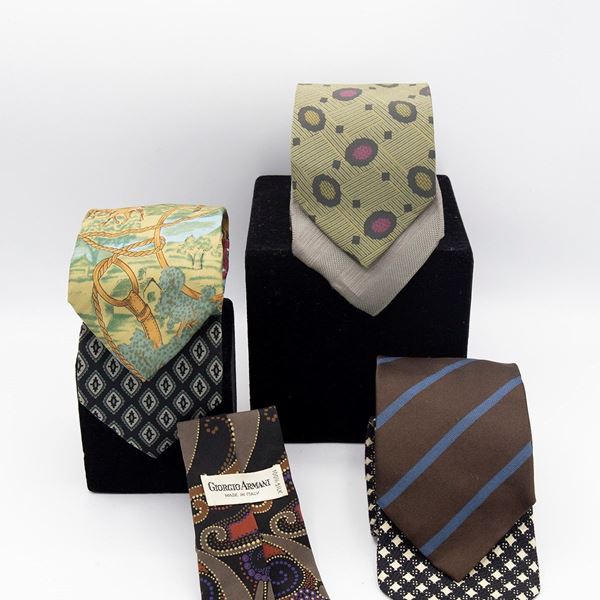Giorgio Armani - Set of 7 Giorgio Armani ties in various colors and textures.