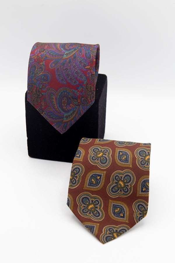 Yves  Saint Laurent - Set of 2 Yves Saint Laurent ties in various colors and textures.