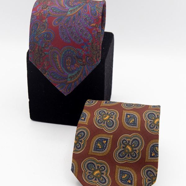 Yves  Saint Laurent - Set of 2 Yves Saint Laurent ties in various colors and textures.