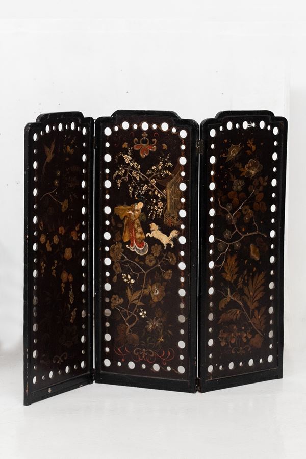 Antique oriental wooden screen with English lacquer.
