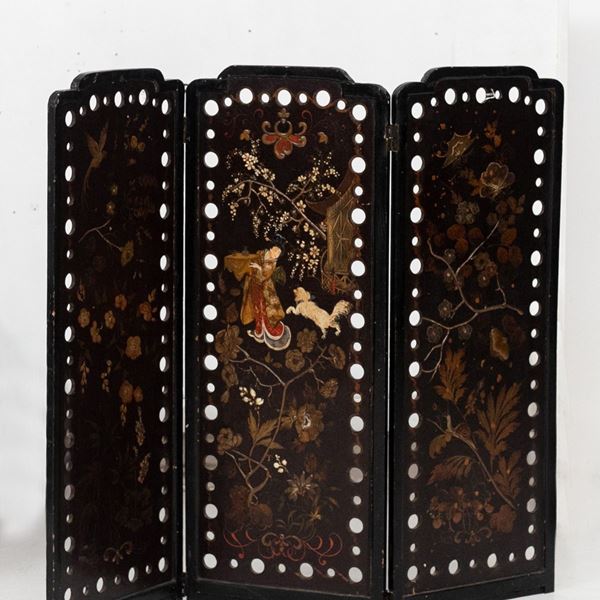 Antique oriental wooden screen with English lacquer.