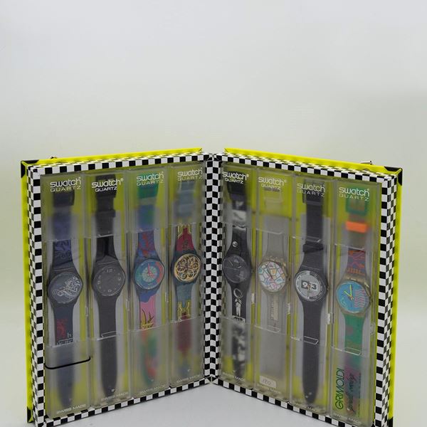 Swatch - Set di 8 Swatch in confezione Grimondi