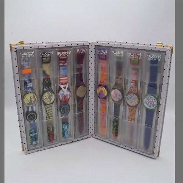 Swatch - Set di 8 Swatch in confezione Grimondi