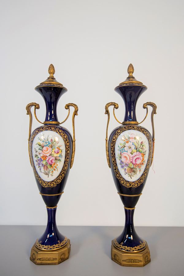 Pair of Blue Ceramic Decorative Vases with Floral Motifs