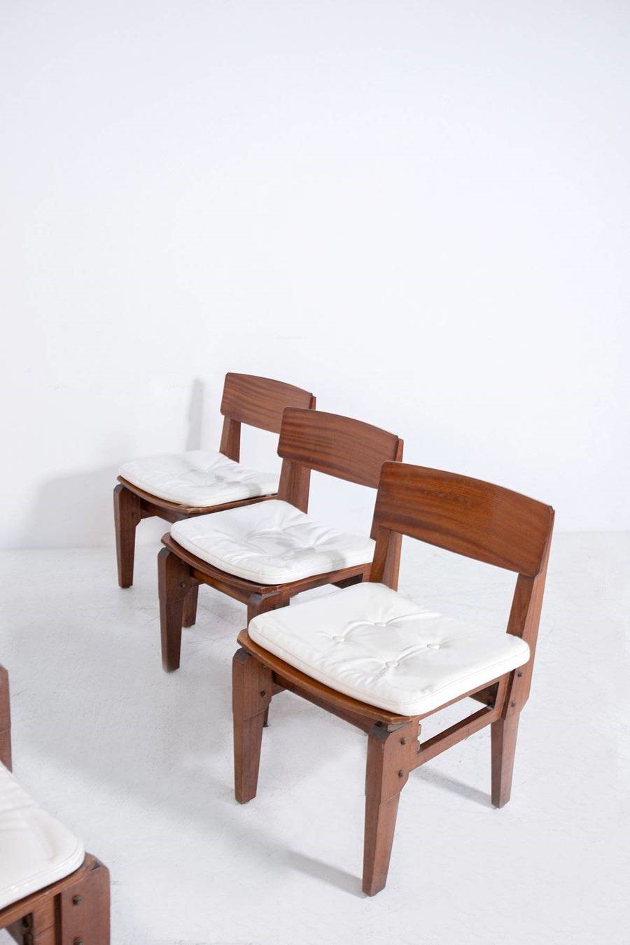 VITO SANGIRARDI. Six mahogany and fabric chairs, 1950s