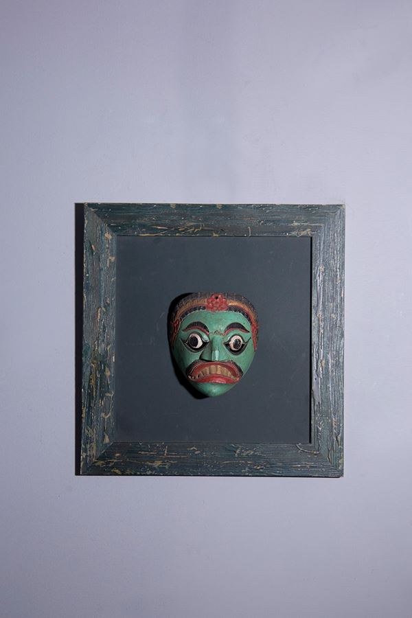 Framework of ornamental Asian mask