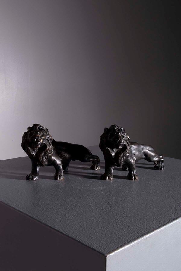 Pair of French bronze lion statues