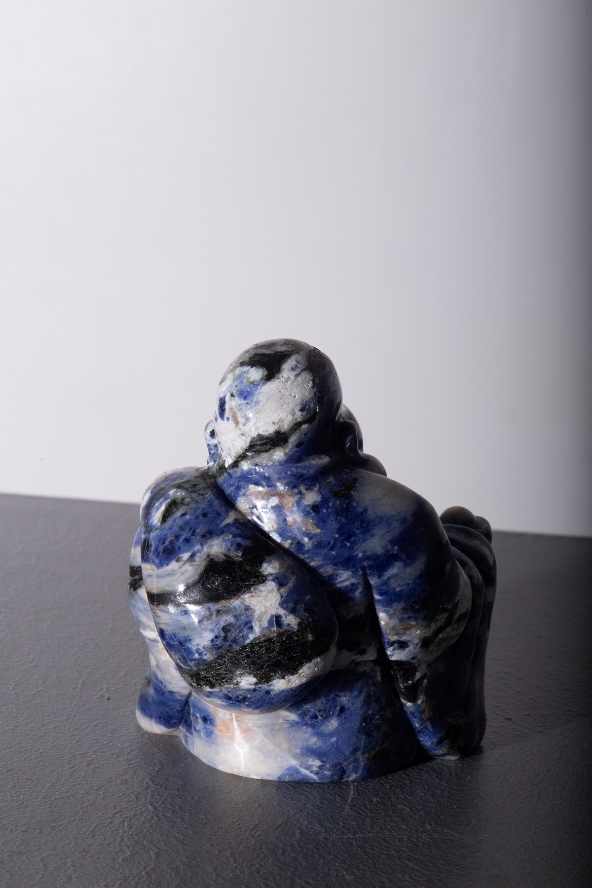 Buddai Buddha in jada blu strisce