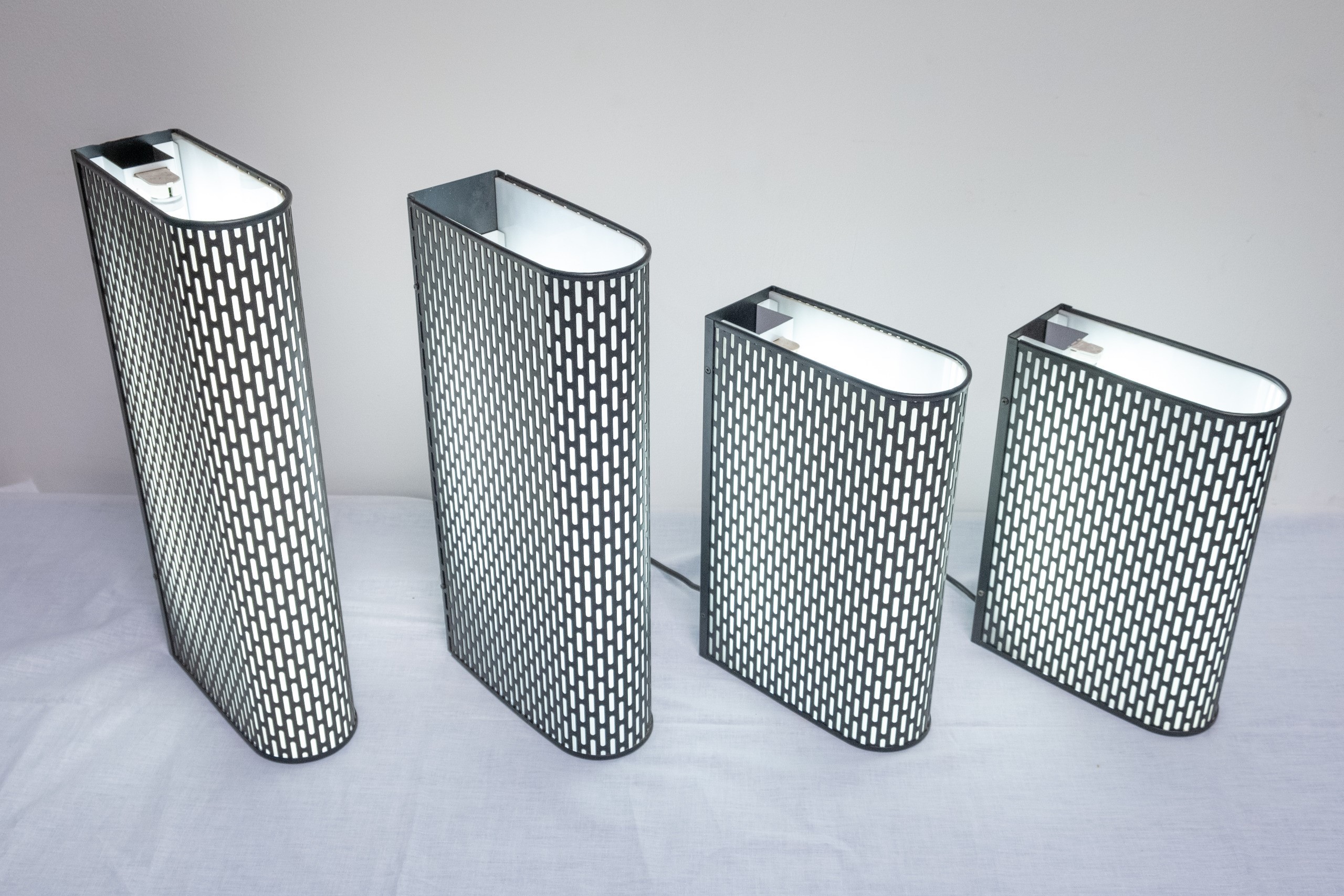 Quattro lampade da parete