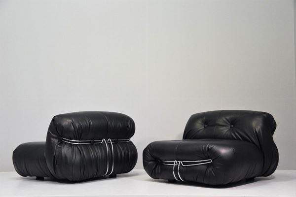 Pair of black leather Soriana Cassina armchairs