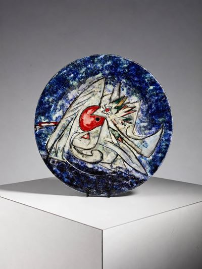 Piatto in ceramica firmato