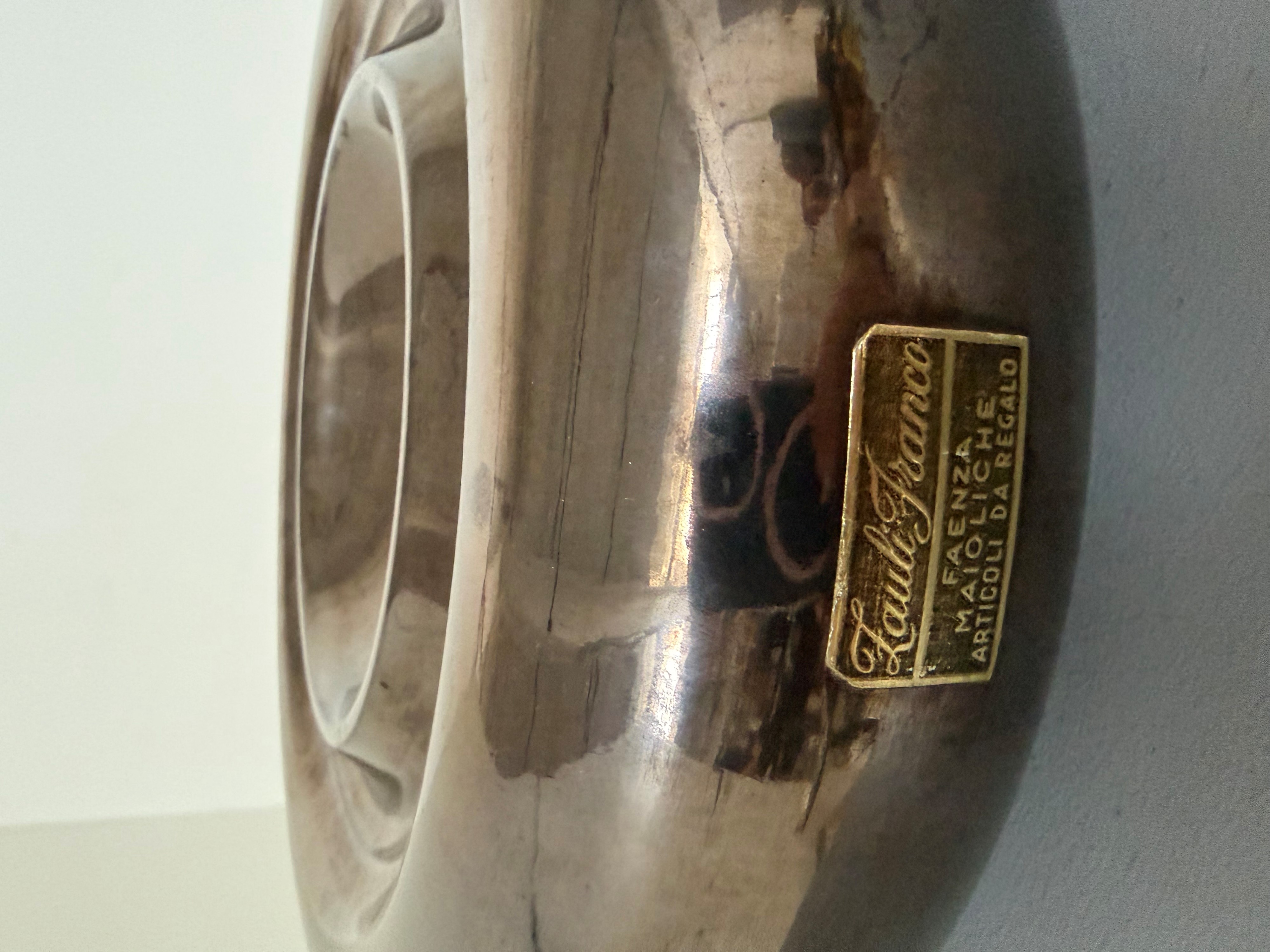 Franco Zauli - Svuota tasche in metallo argentato