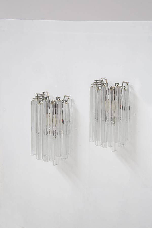 Pair of wall sconces by Venini in iron and glass.