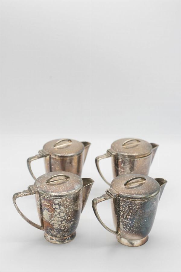 Set of Four Vintage Silver Milk Jugs